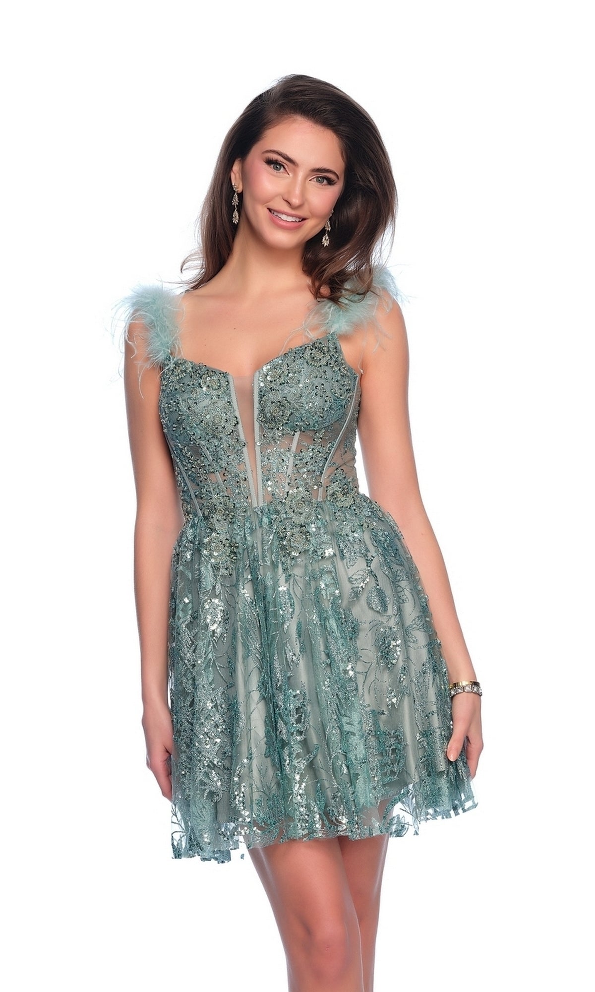 A woman wearing the Dave & Johnny Short Green Sequin Hoco Dress 11908 stands smiling against a white background.